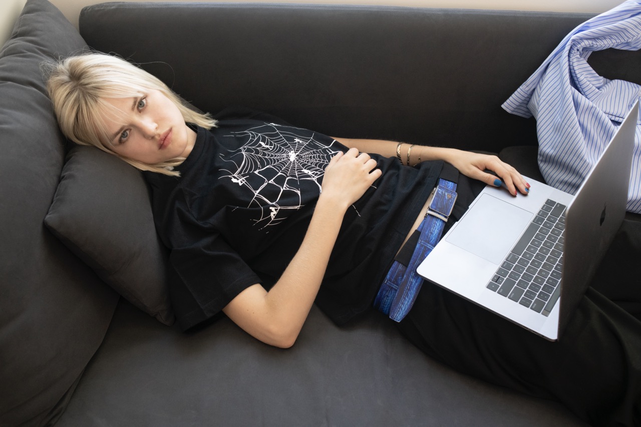 SSSTUFF FW24 Campaign by richard kern blonde girl on couch laptop 2