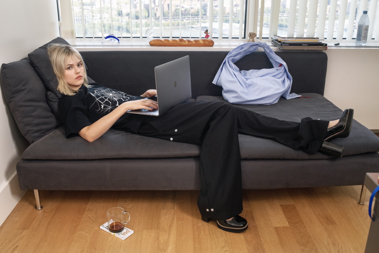 SSSTUFF FW24 Campaign by richard kern blonde girl on couch laptop